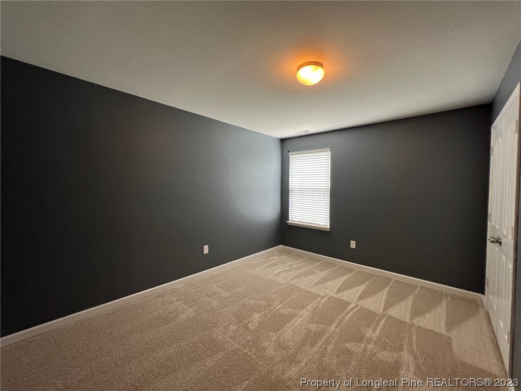 251 Botanical Court Bunnlevel, NC 28323 - Photo 9 of 20 a view of an empty room with a window