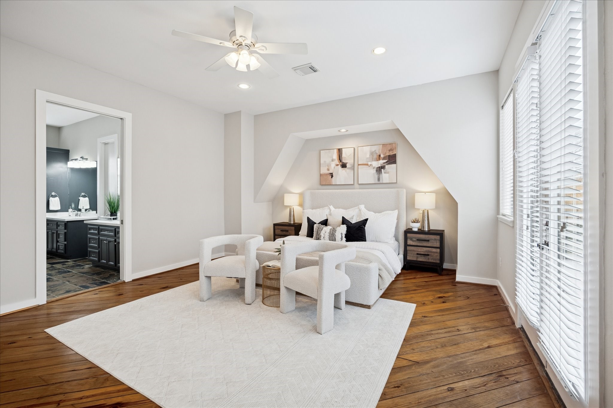 910 Malone Street, Unit 104 Houston, TX 77007 - Photo 30 of 44 Alternate view of Primary Bedroom suite with gleaming pine wood floors and fresh paint