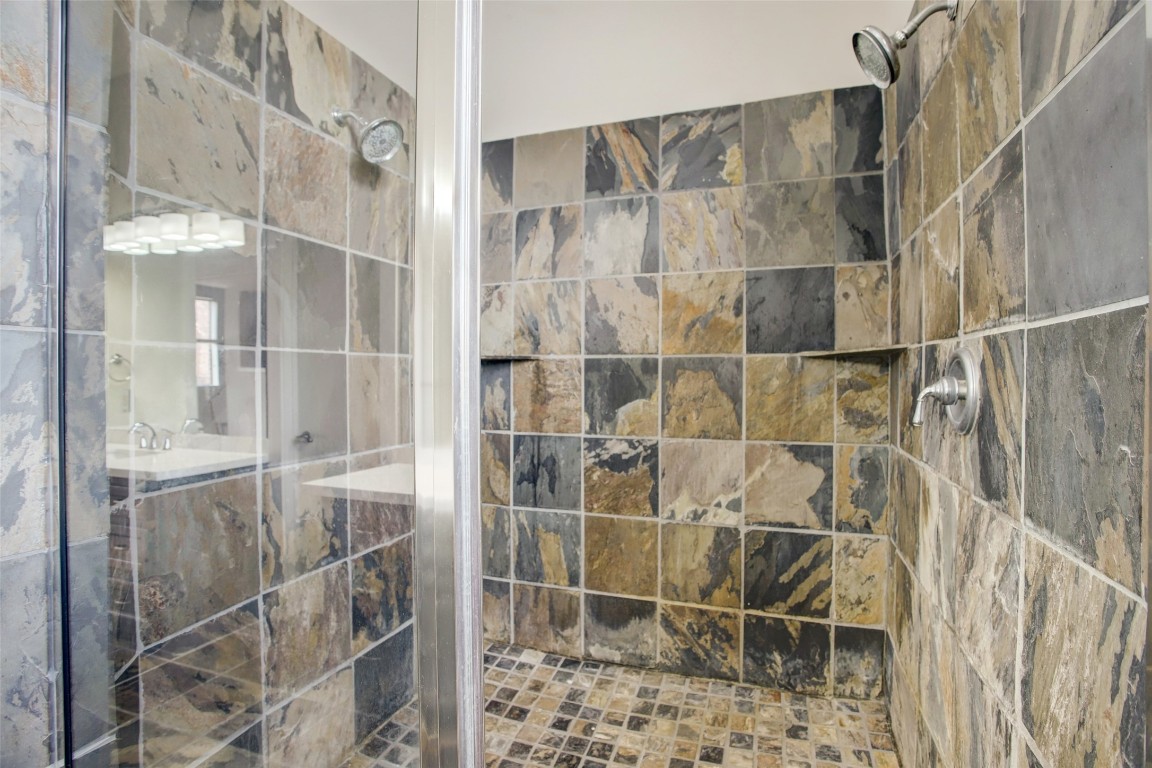 910 Malone Street, Unit 104 Houston, TX 77007 - Photo 33 of 44 Primary Bath features oversized shower with dual shower heads