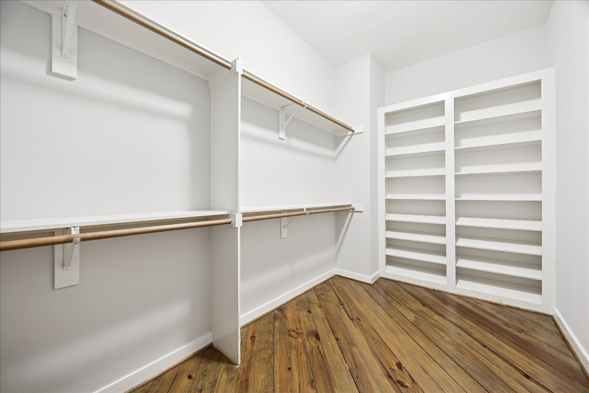 910 Malone Street, Unit 104 Houston, TX 77007 - Photo 34 of 44 Enormous Primary Closet with ample shelving and hanging space