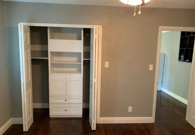 an empty room with closet