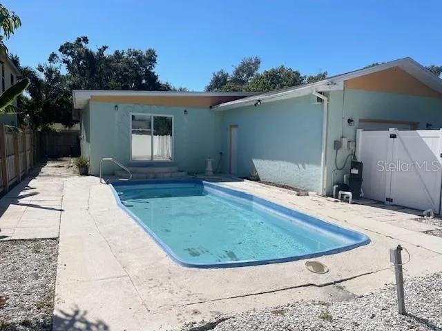 a view of a backyard of a house