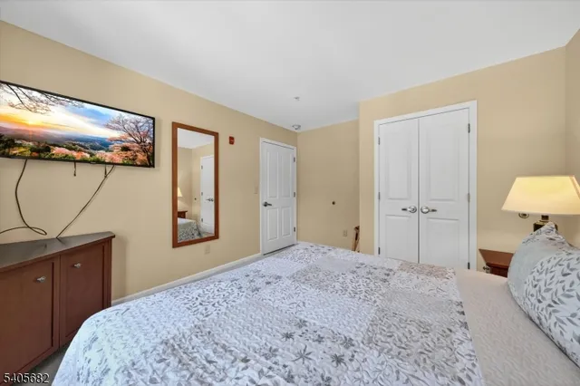 a balcony with chairs and a table