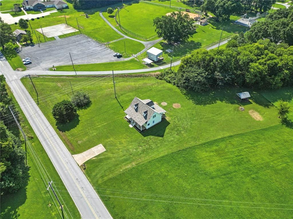 a backyard of a house with lots of green space