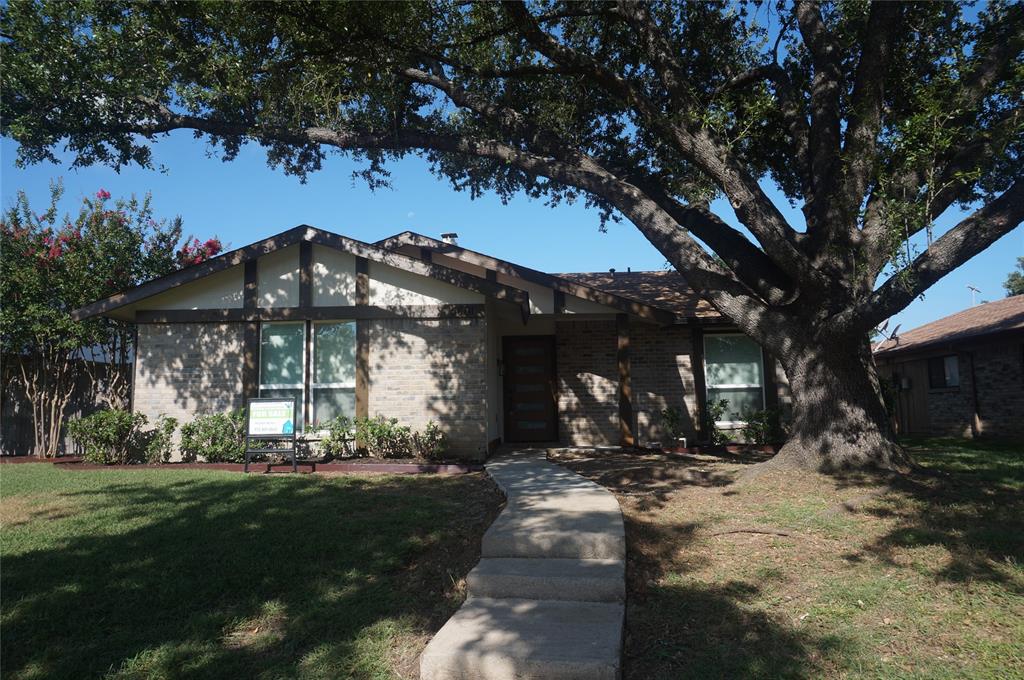 a view of a building with a pathway