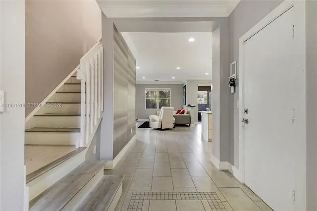 a view of a living room and a livingroom with furniture