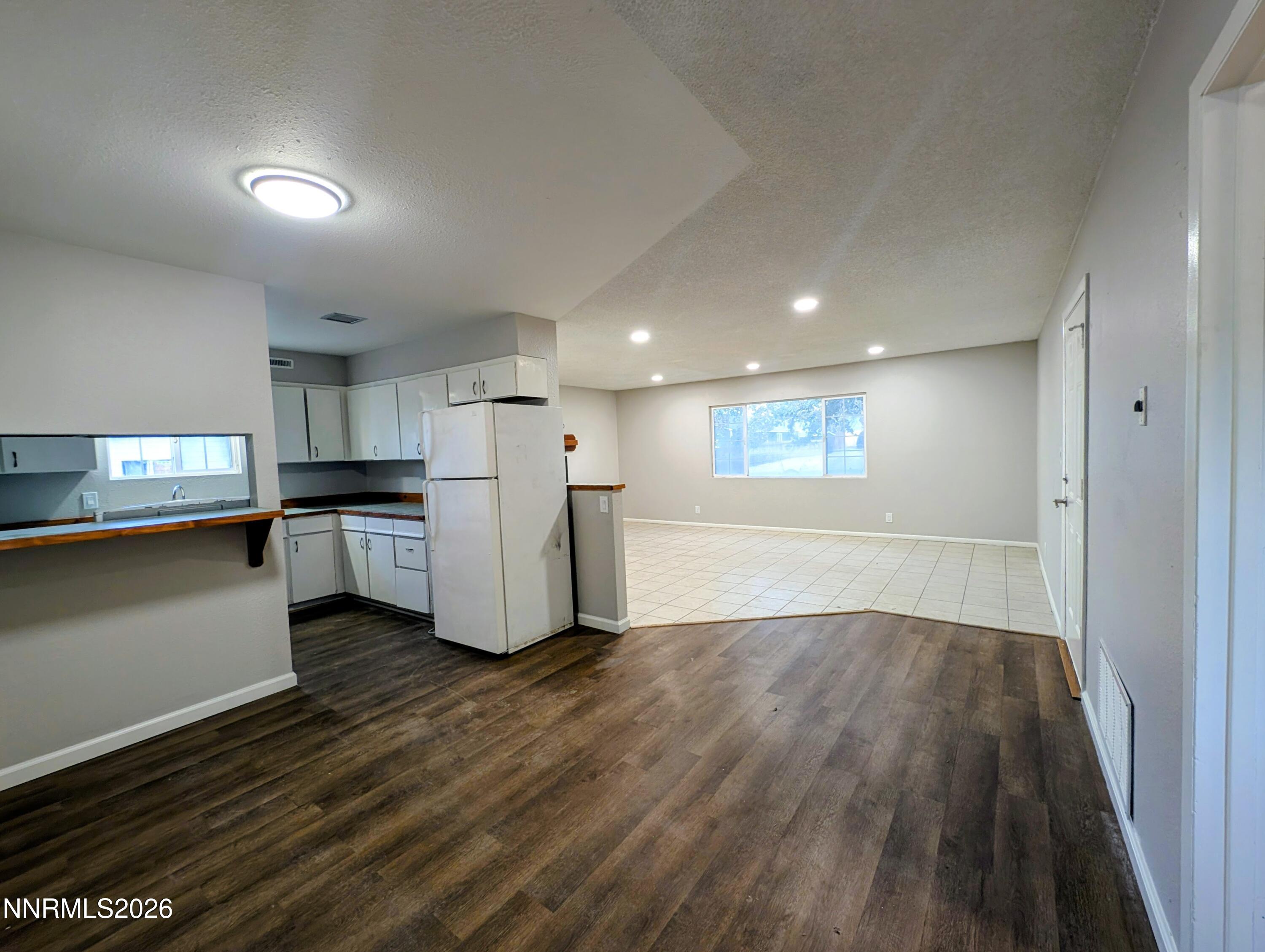 367 Connelly Street Hawthorne, NV 89415 - Photo 12 of 32 a view of kitchen with wooden floor and electronic appliances