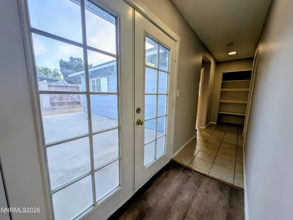 a view of a room with a cabinets and a fireplace