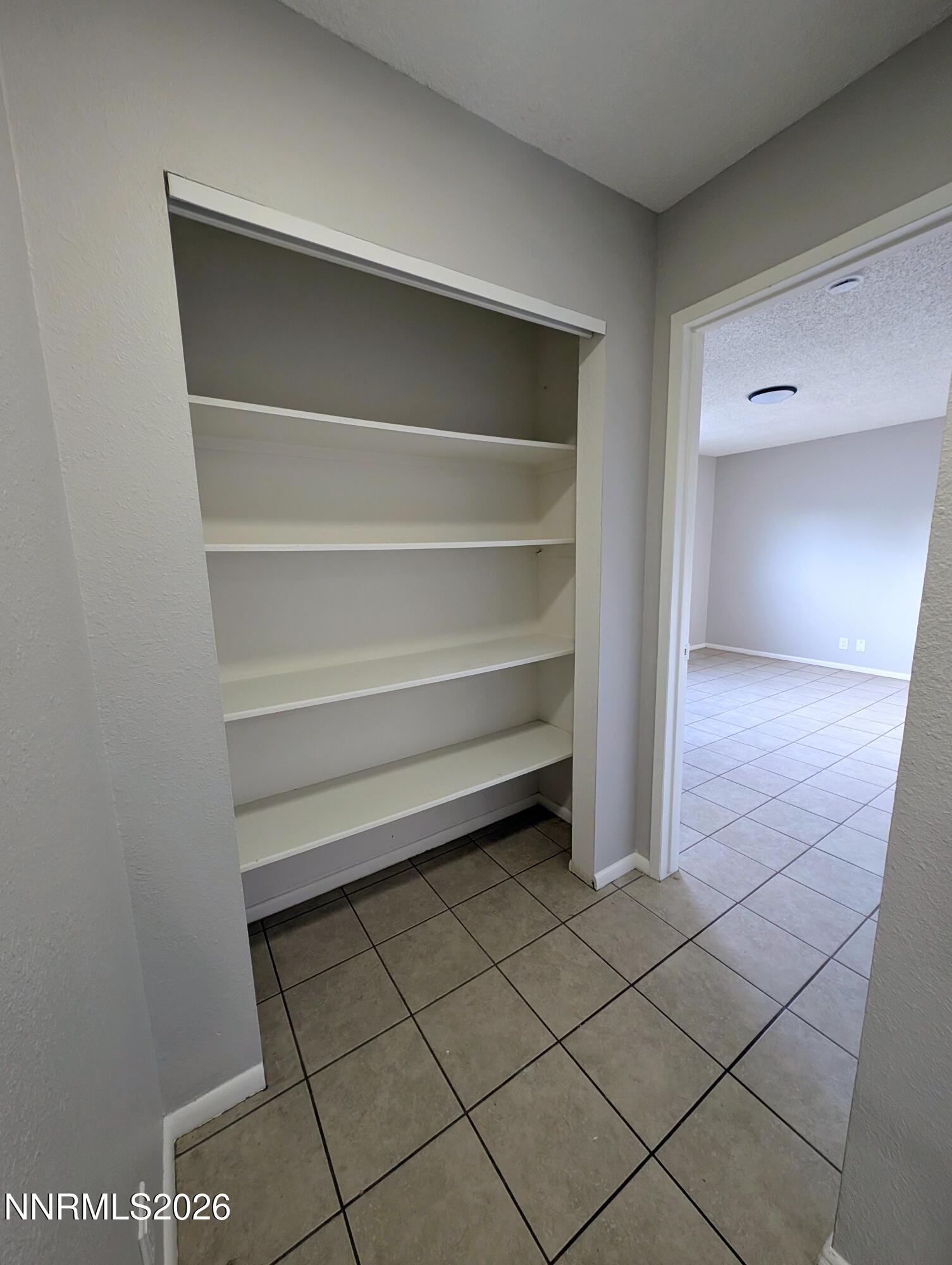 367 Connelly Street Hawthorne, NV 89415 - Photo 17 of 32 a view of a room with a cabinets and a fireplace