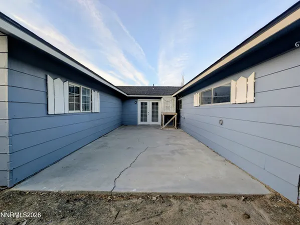 a view of backyard of house