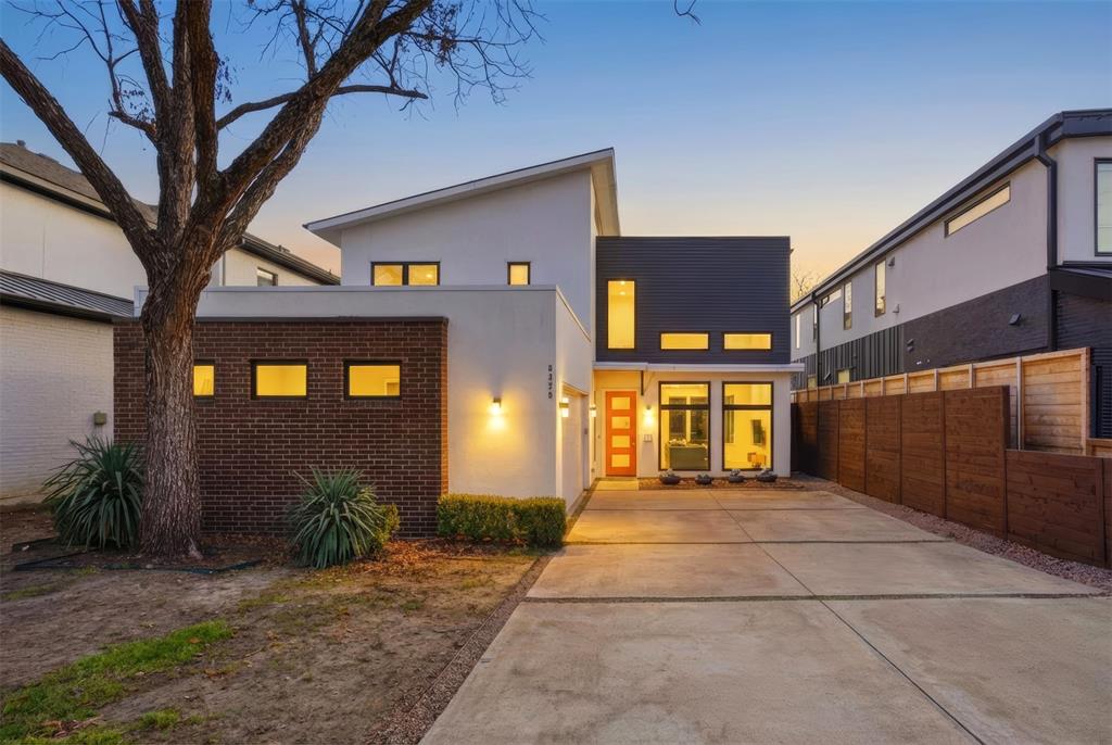 5326 Manett Street Dallas, TX 75206 - Photo 11 of 36 a front view of a building with a yard