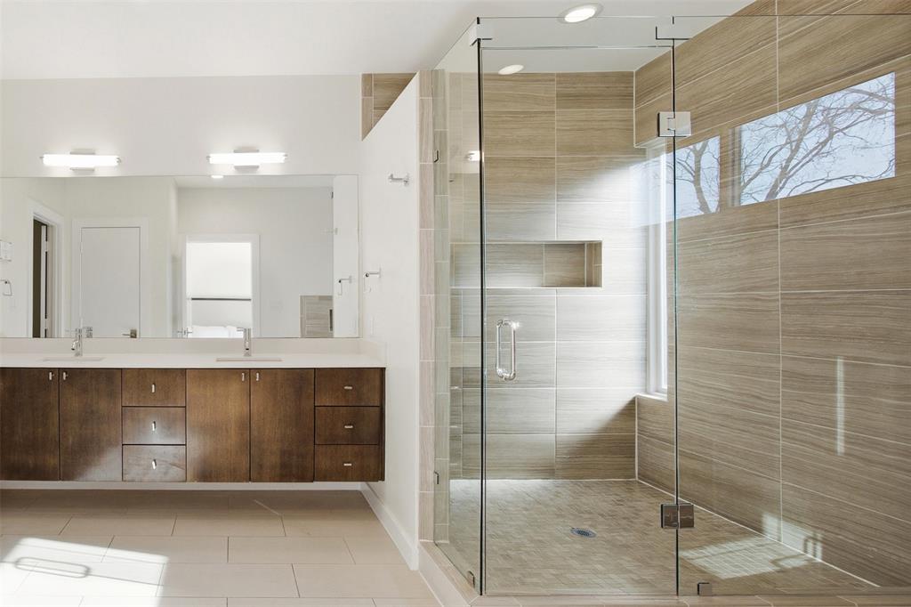 5326 Manett Street Dallas, TX 75206 - Photo 14 of 36 a bathroom with a shower and a sink