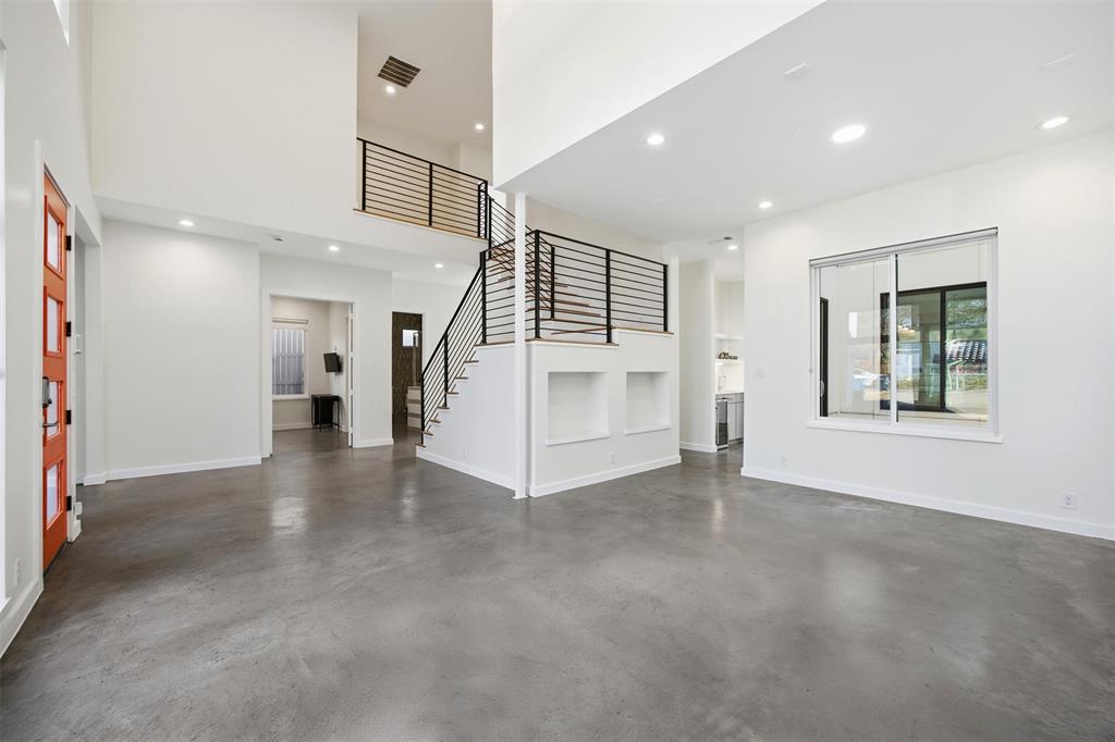 5326 Manett Street Dallas, TX 75206 - Photo 21 of 36 an empty room with a kitchen and entryway