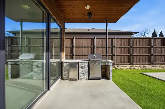 a view of a backyard with swimming pool