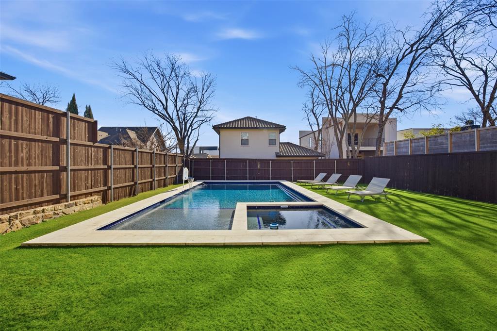 5326 Manett Street Dallas, TX 75206 - Photo 32 of 36 a view of backyard with swimming pool and seating space
