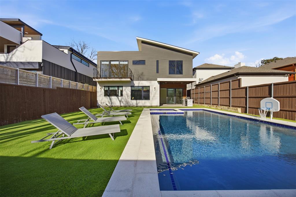 5326 Manett Street Dallas, TX 75206 - Photo 34 of 36 a view of a patio with table and chairs with wooden floor