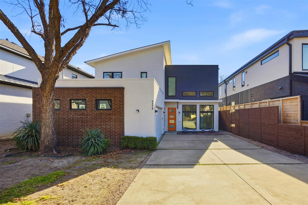 5326 Manett Street Dallas, TX 75206 - Photo 36 of 36 a front view of a house with a yard