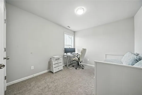 a view of a room with a window