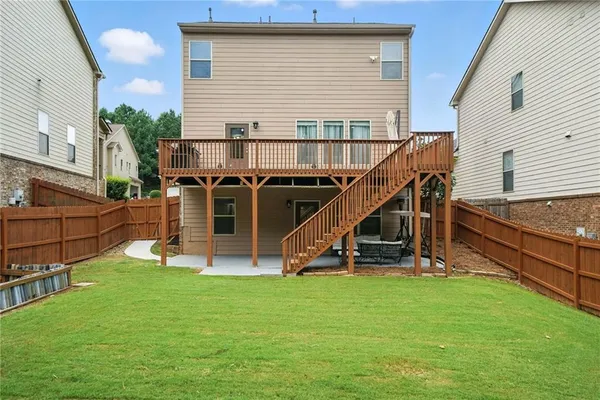 a view of a house with a park