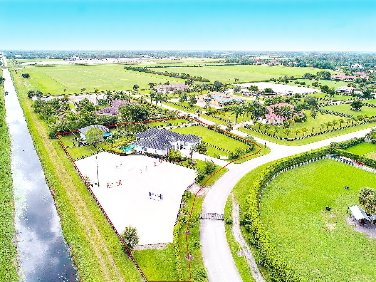 13200 Southfields Road Wellington, FL 33414 - Photo 3 of 39 SOUTHFIELDS AERIAL FROM CANAL