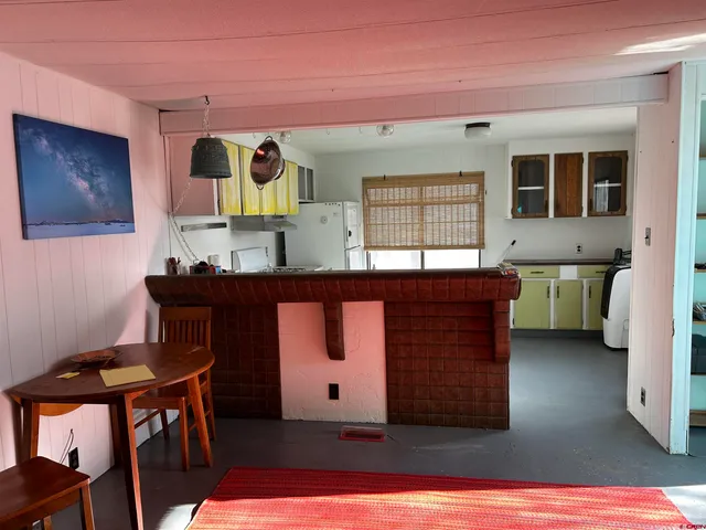 a room with furniture and window