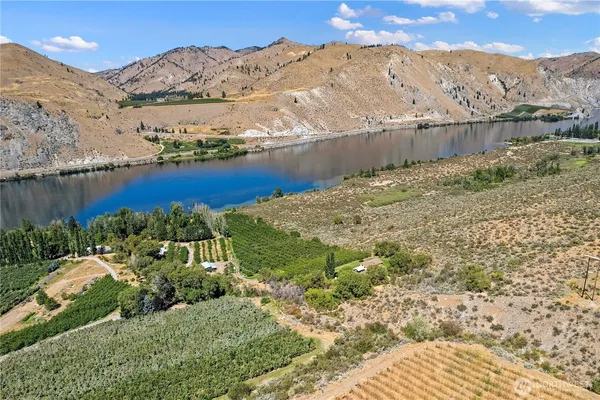 a view of a yard with a lake view