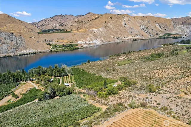 a view of a yard with a lake view