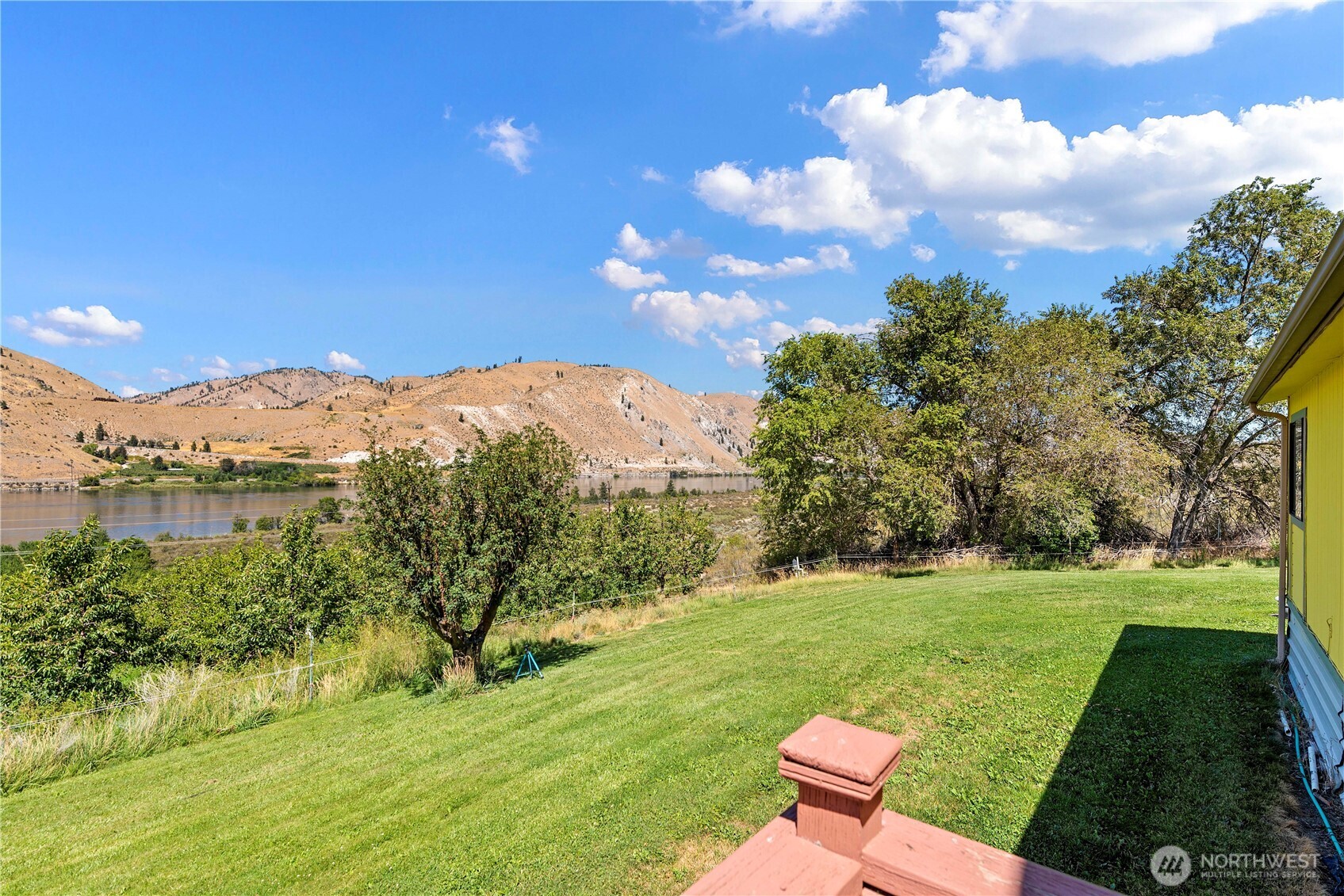 106 Silvest Road Orondo, WA 98843 - Photo 15 of 38 a view of a garden with a building