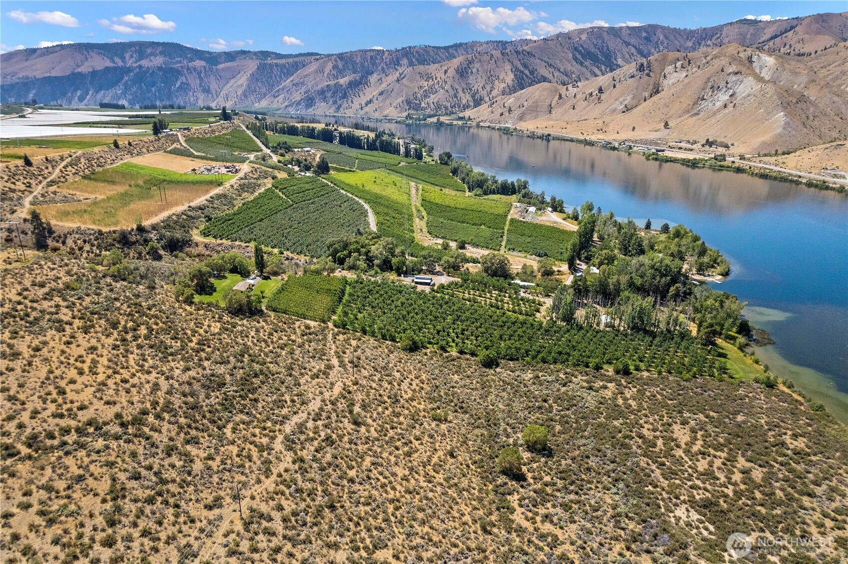 106 Silvest Road Orondo, WA 98843 - Photo 2 of 38 a view of a backyard with swimming pool