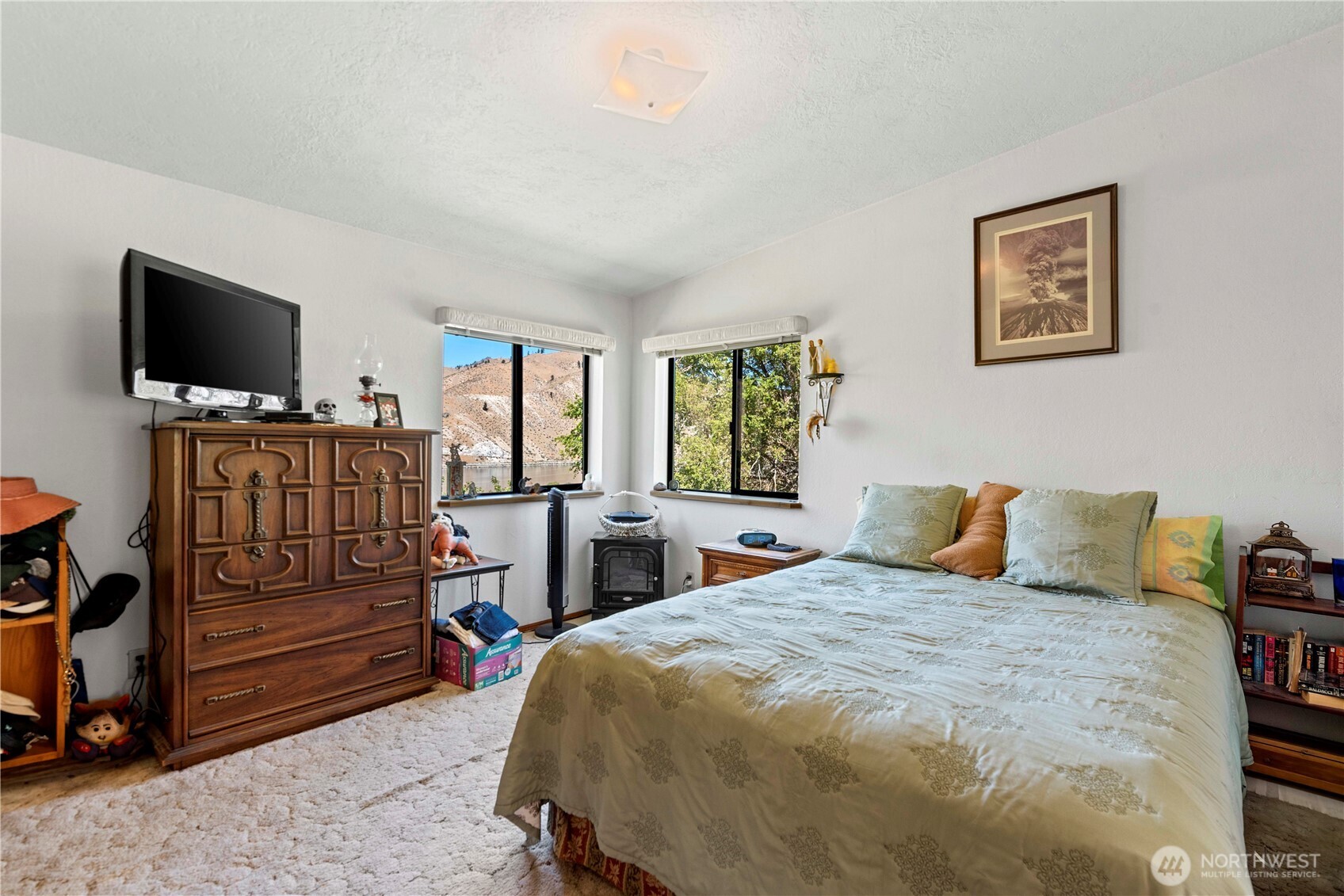 106 Silvest Road Orondo, WA 98843 - Photo 25 of 38 a bedroom with a bed and furniture