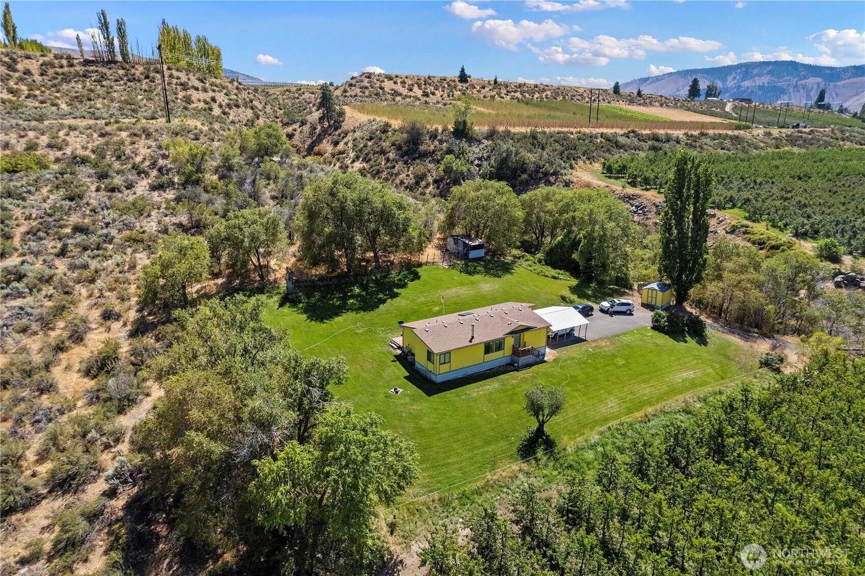 106 Silvest Road Orondo, WA 98843 - Photo 10 of 38 a view of a garden with houses