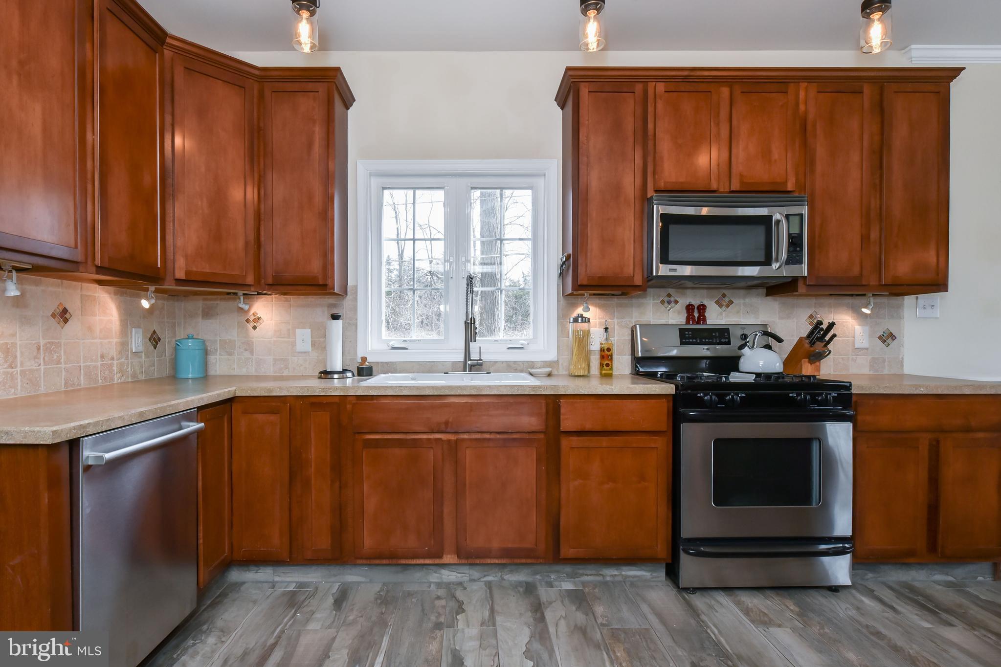 197 Old Locust Point Road Elkton, MD 21921 - Photo 11 of 30 Large kitchen with lots of counterspace