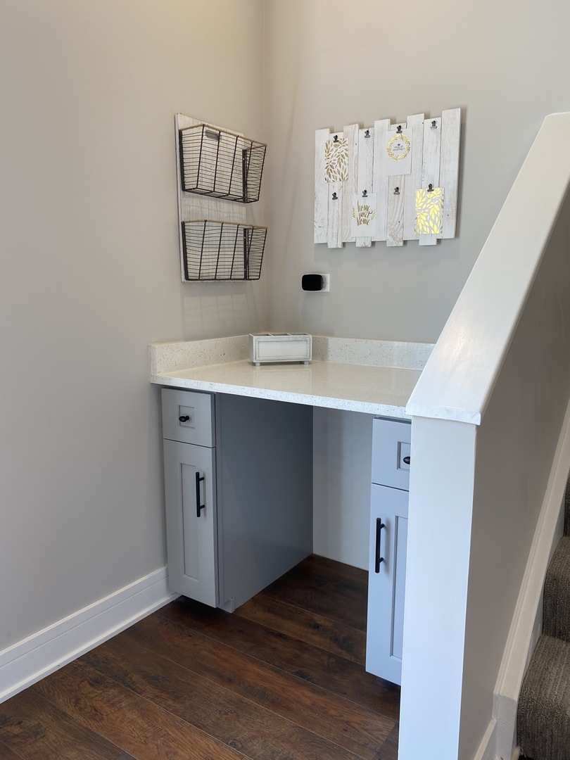 8211 43rd Place Lyons, IL 60534 - Photo 13 of 25 a view of an entryway with wooden floor