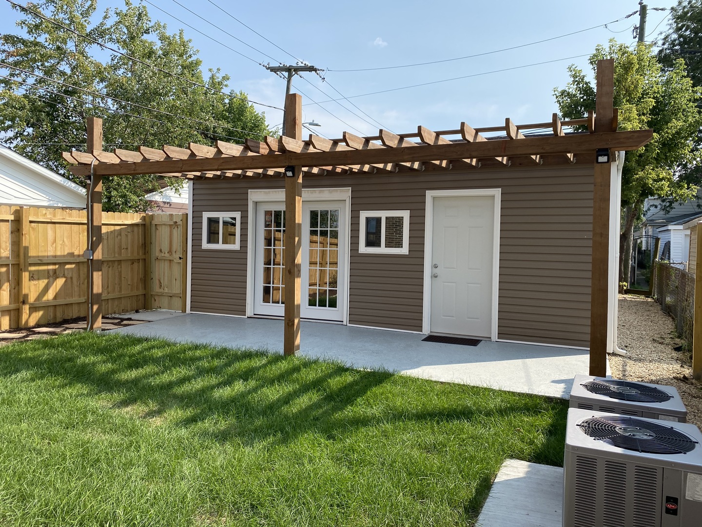 8211 43rd Place Lyons, IL 60534 - Photo 24 of 25 a view of a backyard with plants and large tree