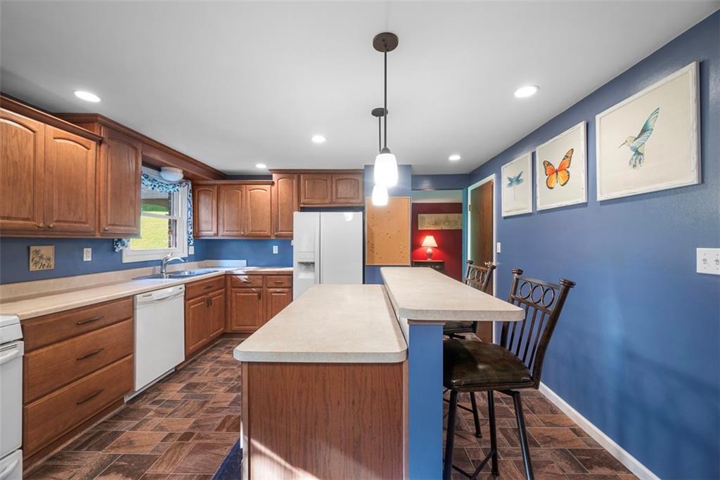 10 Quail Court Export, PA 15632 - Photo 16 of 50 Soft closed drawers, butcher block station and tiered island are a few highlights to the room.
