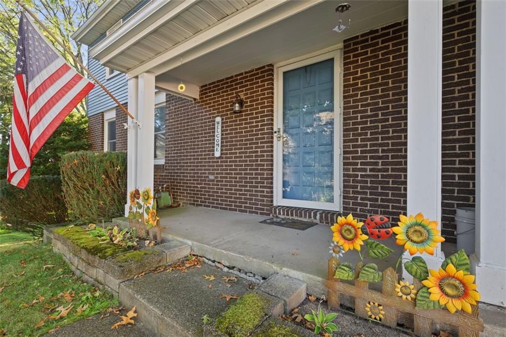 10 Quail Court Export, PA 15632 - Photo 3 of 50 Desirable covered porch leads the way into the home.