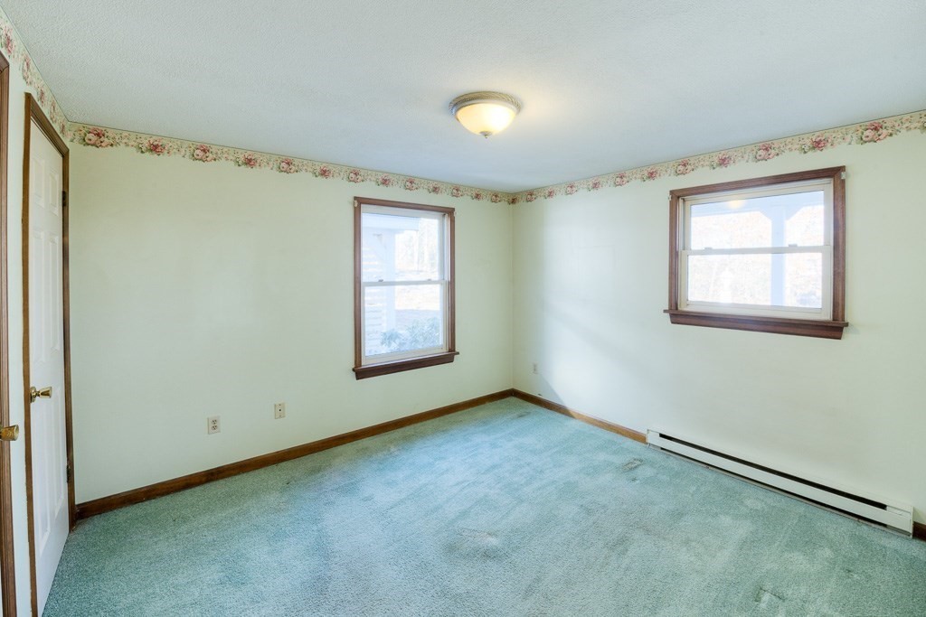 42 Waid Road Monson, MA 01057 - Photo 5 of 39 a view of an empty room with a window