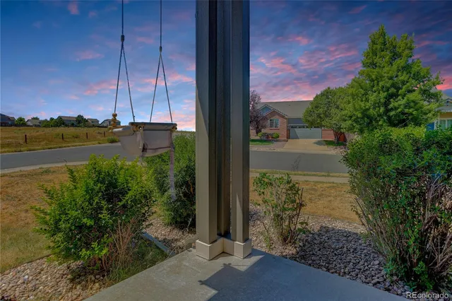 a view of a yard in front of a house with a yard