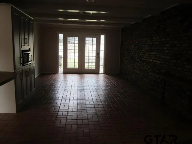 a view of gallery with windows