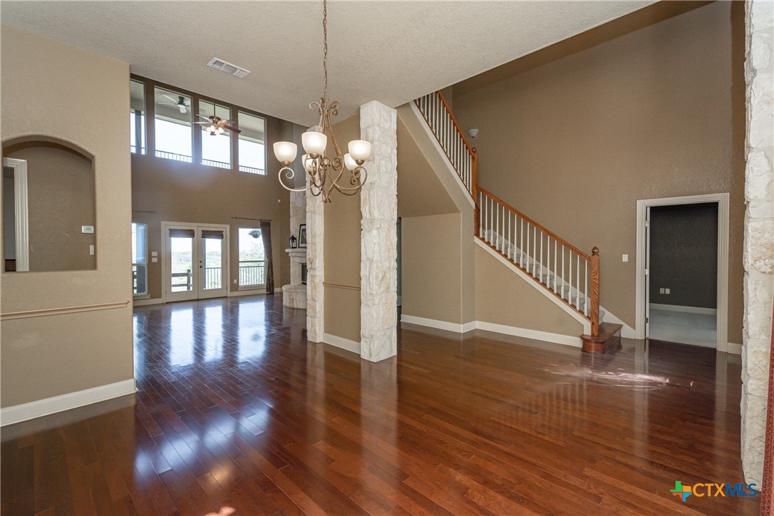 451 Winding View New Braunfels, TX 78132 - Photo 12 of 47 a view of entryway and hall with wooden floor