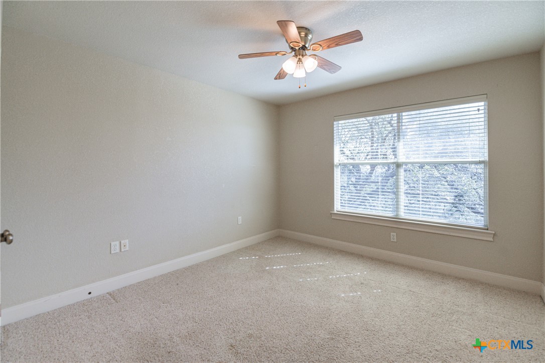 451 Winding View New Braunfels, TX 78132 - Photo 35 of 47 an empty room with a window