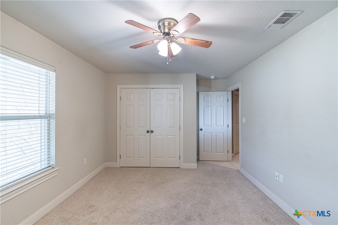 451 Winding View New Braunfels, TX 78132 - Photo 36 of 47 a view of an empty room with a window