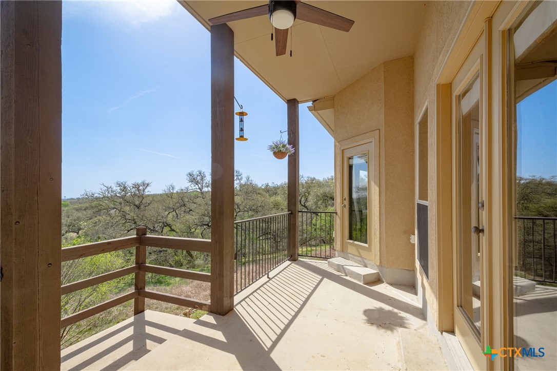 451 Winding View New Braunfels, TX 78132 - Photo 37 of 47 a view of a glass door with a balcony