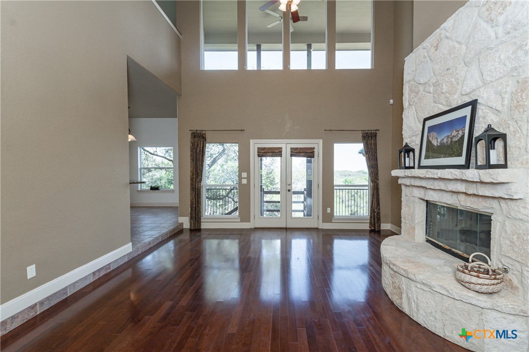 451 Winding View New Braunfels, TX 78132 - Photo 8 of 47 a living room with furniture and a fireplace