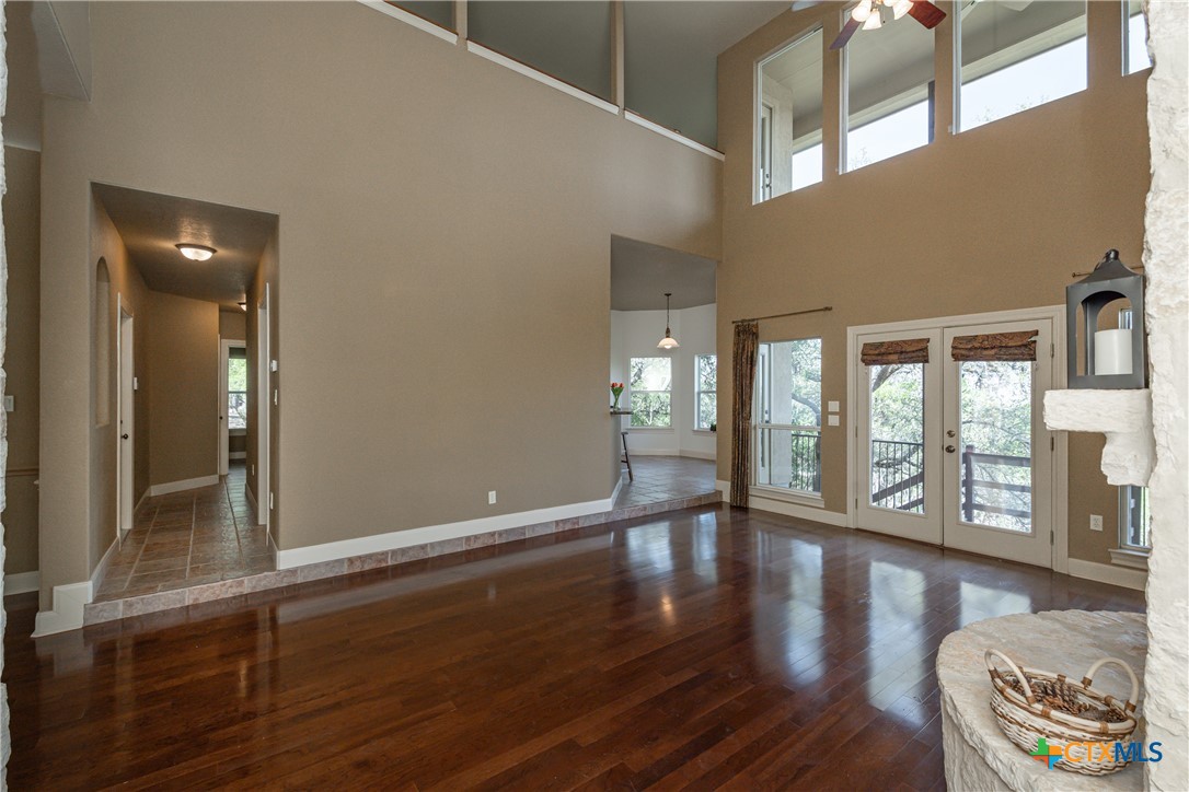 451 Winding View New Braunfels, TX 78132 - Photo 10 of 47 a view of an entryway with wooden floor