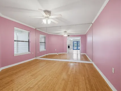 a view of an empty room with a window