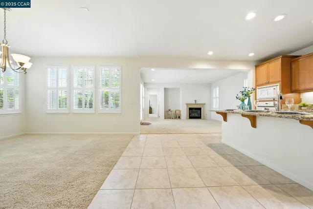 a view of a kitchen with furniture and a kitchen view