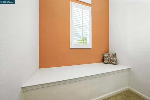 a spacious bathroom with a tub sink shower and mirror