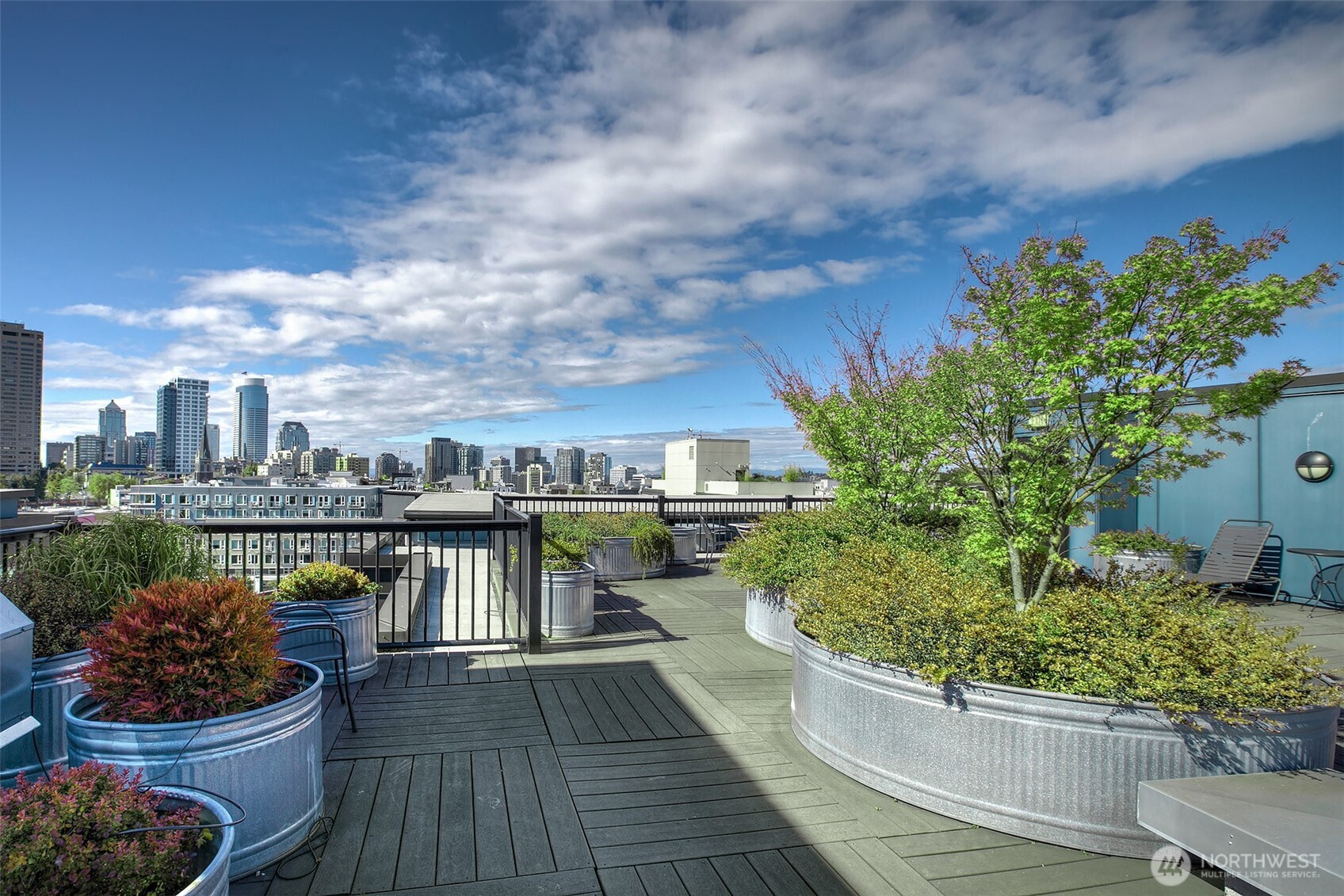 1414 12th Avenue, Unit 504 Seattle, WA 98122 - Photo 22 of 23 a view of a terrace with sitting area