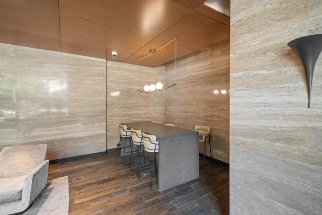 a bathroom with a shower and a toilet